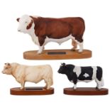 A Beswick Connoisseur Polled Hereford Bull on a wooden plinth and two others