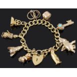 An 18ct gold curb link charm bracelet