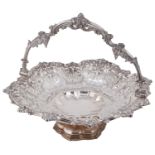 An early Victorian silver swing handled cake basket