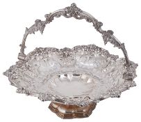 An early Victorian silver swing handled cake basket