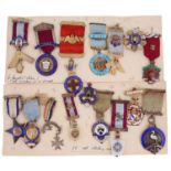 A collection of early 20th c. silver gilt and enamel Masonic jewels on ribbons and badges c.1920