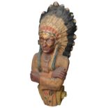 A 19th/early 20th c. polychrome decorated wood carving in the form of a Native American chieftain