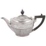 A late Victorian silver presentation teapot