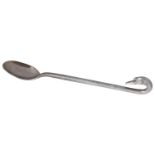 A contemporary silver spoon