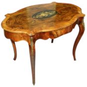 A late 19th century Fr. Louis XV style walnut and marquetry inlaid oval centre table