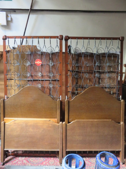 PAIR OF STAPLES & CO EDWARDIAN OAK SINGLE BED FRAME