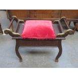 HEAVILY CARVED BRASS MOUNTED OAK PIANO STOOL