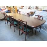 STYLISH DANISH ROSEWOOD EXTENDING DINING TABLE WITH TWO LEAVES AND SIX CHAIRS