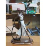 ITALIAN ART DECO FIGURE ON STAND (AT FAULT),