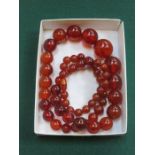 STRAND OF GRADUATED AMBER BEADS