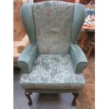 UPHOLSTERED WING ARMCHAIR