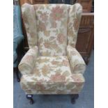 UPHOLSTERED WING ARMCHAIR