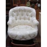 UPHOLSTERED LOW SEATED VICTORIAN STYLE BUTTON BACK EASY ARMCHAIR