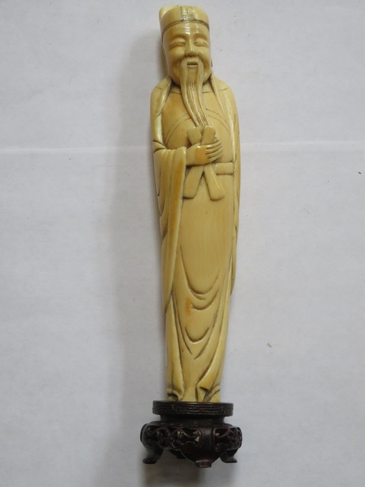 19th CENTURY ORIENTAL IVORY FIGURE OF A GENT ON WOODEN STAND,