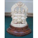 SMALL ANTIQUE INDIAN STYLE IVORY CARVING ON STAND