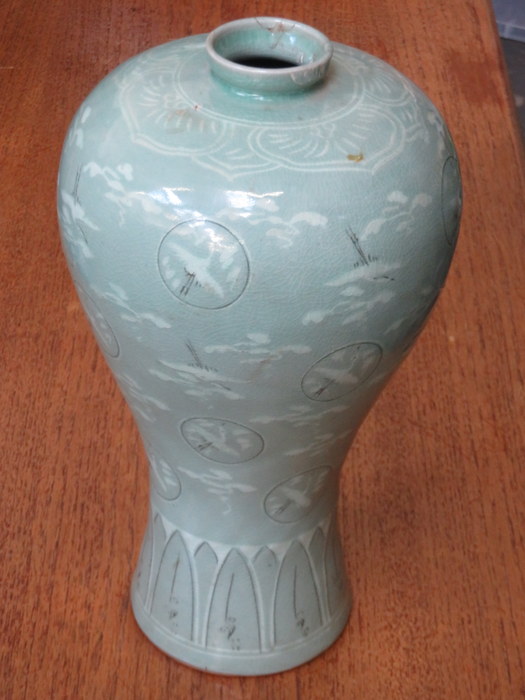 DECORATIVE ORIENTAL STYLE LIGHT GREEN GLAZED POTTERY PLUM VASE (AT FAULT),