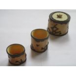 THREE GRADUATED ORIENTAL ANTIQUE IVORY STORAGE POTS, ONE WITH COVER,