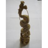 GOOD QUALITY ANTIQUE CHINESE IVORY TWIST DECORATED MYTHICAL DRAGON CARVING, SIGNED TO BASE,