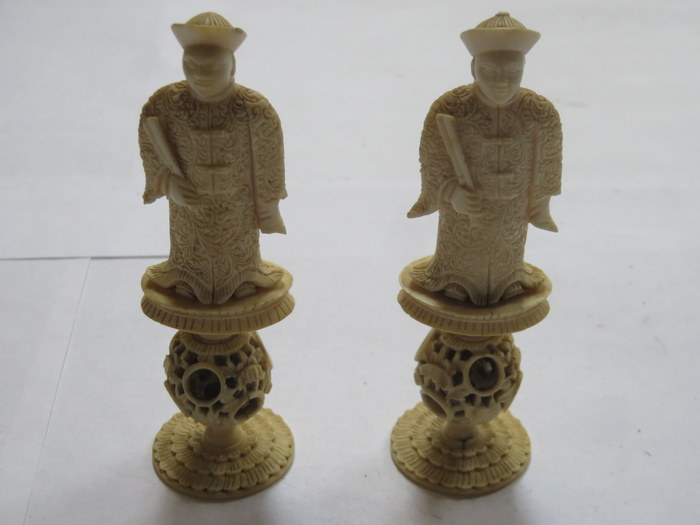 PAIR OF HEAVILY CARVED ORIENTAL ANTIQUE IVORY PUZZLE BALL CHESS PIECES,