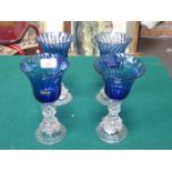 SET OF FOUR GORDIOLA DECORATIVE STEMMED BLUE GLASS GOBLETS (ONE AT FAULT),