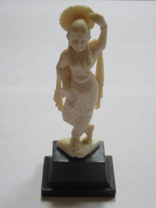 ANTIQUE CARVED IVORY FIGURE OF AN INDIAN (?) GODDESS ON WOODEN STAND,