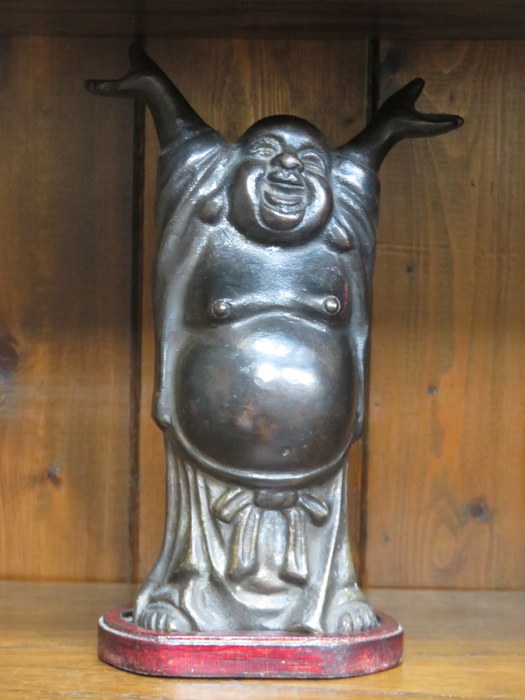 BRONZED BUDDHA ON WOODEN STAND,