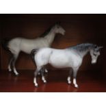 TWO BESWICK UNGLAZED GREY HORSES