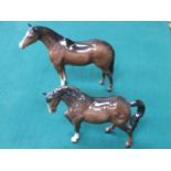 TWO BESWICK GLAZED CERAMIC BROWN HORSES