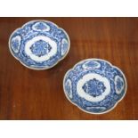 PAIR OF ORIENTAL BLUE AND WHITE WAVE EDGED CERAMICS SHALLOW BOWLS,