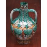 JESSIE SINCLAIR FOR DELLA ROBIA, HANDPAINTED AND GLAZED TWO HANDLED VASE,