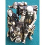 HEAVILY CARVED ANTIQUE ORIENTAL IVORY FIGURE GROUP, SIGNED TO BASE,