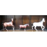 THREE VARIOUS BESWICK UNGLAZED CERAMIC HORSES