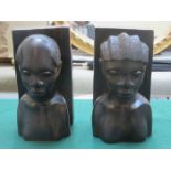 PAIR OF CARVED CEYLONENE STYLE TREEN BOOKENDS