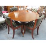 REPRODUCTION MAHOGANY EXTENDING DINING TABLE ON QUADRAFOIL SUPPORTS AND FOUR CHAIRS