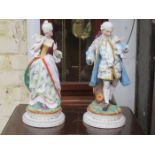 PAIR OF CONTINENTAL STYLE HANDPAINTED AND GILDED, GLAZED AND UNGLAZED BISQUE FIGURES,