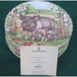 SET OF TWELVE "PIGS IN BLOOM" COLLECTORS PLATES BY CROMPTON AND WOODHOUS FOR ROYAL DOULTON