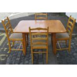 MODERN FOLD OVER DINING TABLE AND FOUR CHAIRS