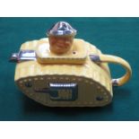 LUSTRE AND YELLOW CRACKLED GLAZED CERAMIC WINSTON CHURCHILL TANK FORM NOVELTY TEAPOT