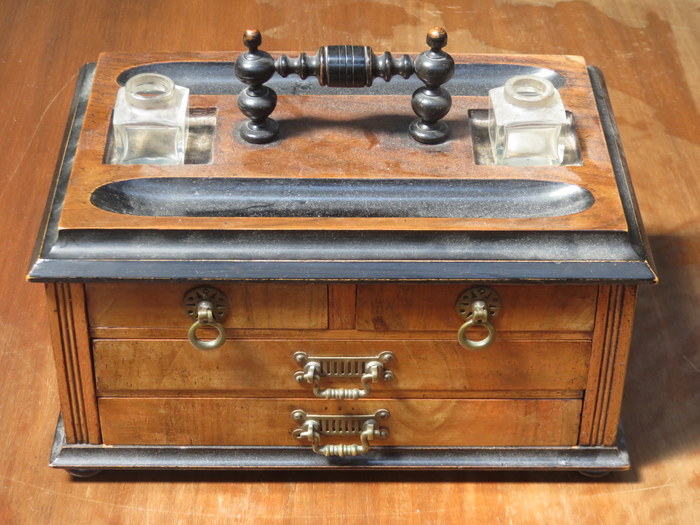 EBONISED AND WALNUT FOUR DRAWER DESK STAND/TIDY