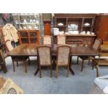 DANISH ROSEWOOD EXTENDING DINING TABLE WITH TWO LEAVES AND SIX (FOUR AND TWO) CHAIRS