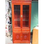 POLISHED HARD WOOD ORIENTAL TWO DOOR DISPLAY UNIT