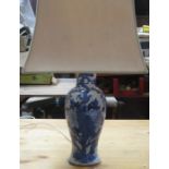 BLUE AND WHITE HIGHLY DECORATIVE ORIENTAL CERAMIC TABLE LAMP AND SHADE