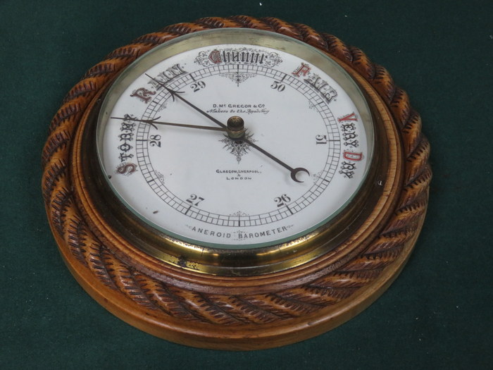 OAK CASED CIRCULAR ANEROID BAROMETER BY D McGREGOR & CO