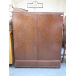 TWO DOOR MAHOGANY RECORD CABINET FITTED WITH DRAWERS BELOW