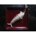 WHITE METAL ARTICULATED FISH FORM STORAGE PENDANT ON SILVER CHAIN