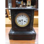 FRENCH BLACK SLATE MANTEL CLOCK WITH ENAMELLED DIAL, BY A SWAFUS,