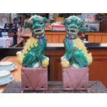 PAIR OF ORIENTAL HANDPAINTED POTTERY DOGS OF FOE APPROX.