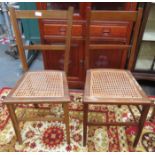 TWO SIMILAR BERGERE SEATED CHAIRS
