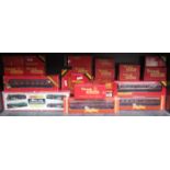 QUANTITY OF HORNBY AND OTHER BOXED OO COACHES AND GOODS WAGONS PLUS EMPTY BOXES