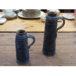 TWO WEST GERMAN STYLE POTTERY BEER STEINS BOTH WITH HALLMARKED SILVER MOUNTS